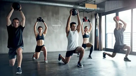 High-intensity interval training (HIIT) workout session at Biohack Miami, featuring dynamic group fitness in a modern wellness space